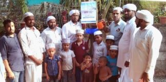 SYS east Kodur installing water bowl for birds