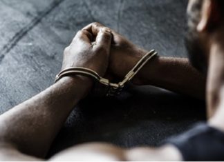 Husband arrested assault on pregnant woman