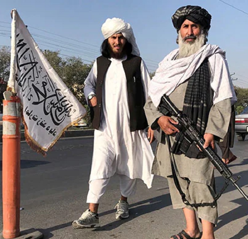 Taliban Activist in public Road with Arms