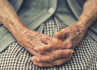 old woman beaten up by son