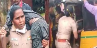 കനത്ത മഴയ്ക്കിടെ യുവാവ് അബോധാവസ്ഥയിൽ; തോളിലേറ്റി വനിതാ ഇന്സ്പെക്ടര് woman-police-inspector-carries-unconscious-man