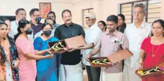 A family with wedding gifts for the girls at the Women's Care Center