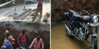 Biker falls into pit