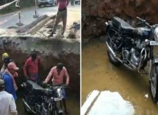 Biker falls into pit