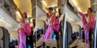 ‘സൂപ്പർ മമ്മി’; ഒരു കയ്യിൽ കുഞ്ഞും മറുകയ്യിൽ ലഗേജും, കാലുകൊണ്ട് കാബിൻ അടച്ച് യുവതി viral video woman with baby in hand closes planes overhead cabin with foot