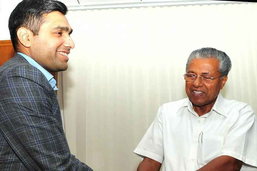 Karan Adani and Pinarayi vijayan