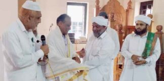 Celebration of Prophet's Day; Postmans Ravindran and Mohandas were honored