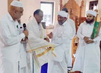 Celebration of Prophet's Day; Postmans Ravindran and Mohandas were honored
