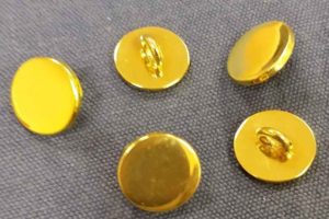 New way of gold Smuggling _195 'golden buttons' worth Rs 17 lakh