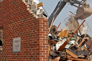 School Wall Demolition for Navakerala Sadas