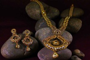 Gold price down again