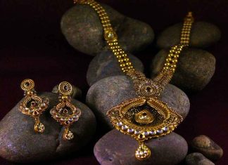 Gold price down again