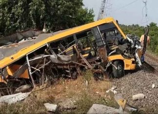 school van collided with a train