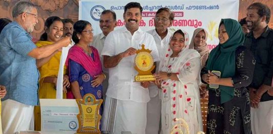 Muneera Koranapatta receives the PCWF Evergreen Ponkathir Award from V S Joy MLA.