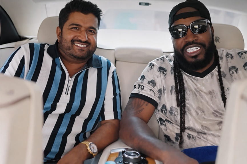 Kochi Blue Tigers owner Subash Manuel and co-owner Chris Gayle seated in a car